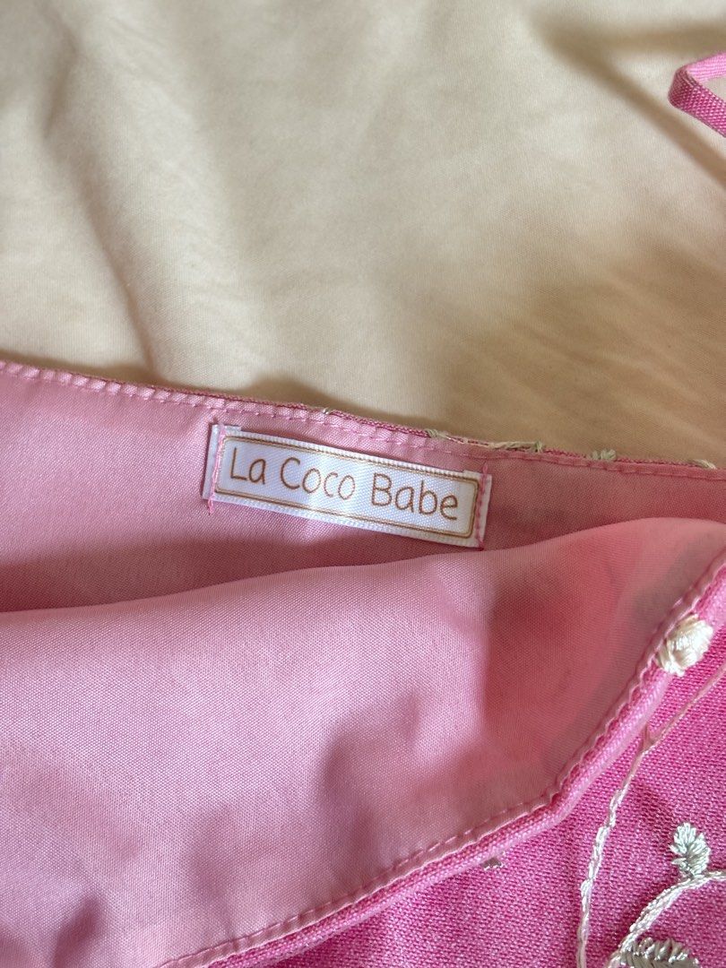 La Coco Babe Mykonos Linen Top (Pink) (Category: Sleeveless) located in Pasig City. Submitted by anything.pre_loved (Listing ID 1465992681, Image 3). Description: 🌸 Note: I have one more La Coco Babe top, St. Louis style, if you will get both, I can sell it to you for only 1400, 2 tops na - Brand: La Coco Babe - Material: Bright pink linen with lined interior - Size: Small on tag but actually fits Medium and semi Large - Details: White and green