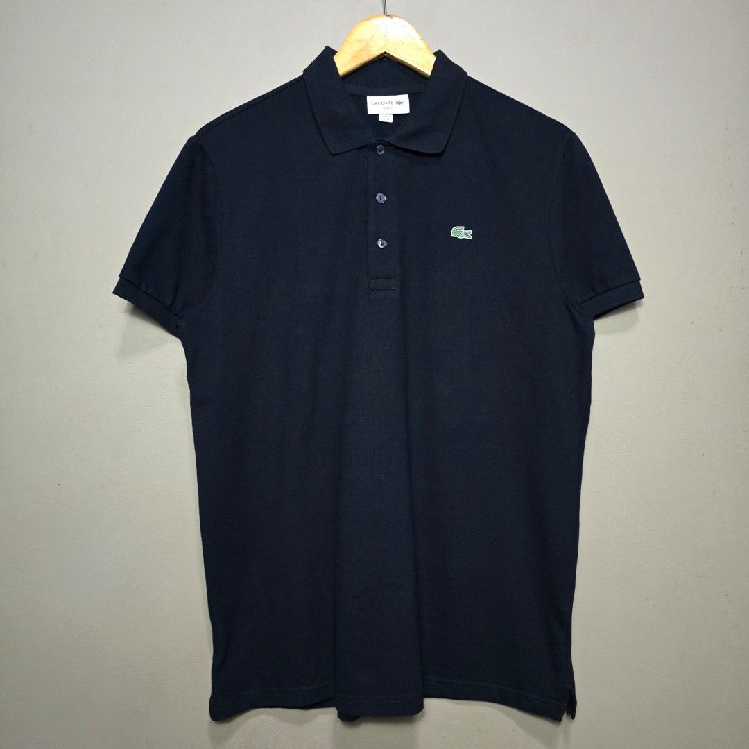 LACOSTE BLACK POLO SHIRT (Category: Tshirts & Polo Shirts ) located in Quezon City. Submitted by somewearinmnl (Listing ID 1466059677, Image 1). Description: LACOSTE BLACK POLO SHIRT - Size: 4 / MEDIUM ( Slim Fit ) - Dimension: 21 W" x 28.5 L" - Good As new - Color rate: 9.8/10 - No Issues - Color may vary due to lighting 📸.