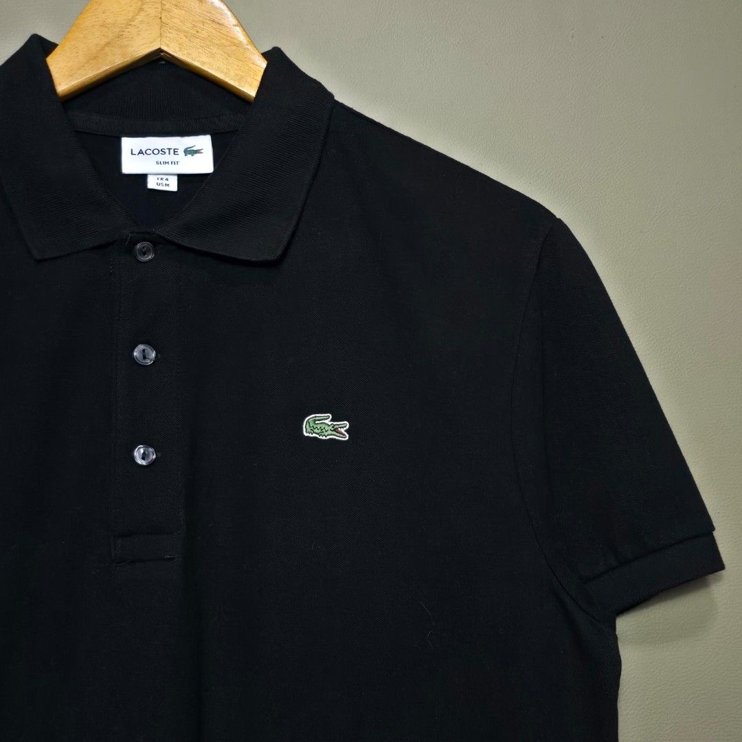 LACOSTE BLACK POLO SHIRT (Category: Tshirts & Polo Shirts ) located in Quezon City. Submitted by somewearinmnl (Listing ID 1466059677, Image 3). Description: LACOSTE BLACK POLO SHIRT - Size: 4 / MEDIUM ( Slim Fit ) - Dimension: 21 W" x 28.5 L" - Good As new - Color rate: 9.8/10 - No Issues - Color may vary due to lighting 📸.