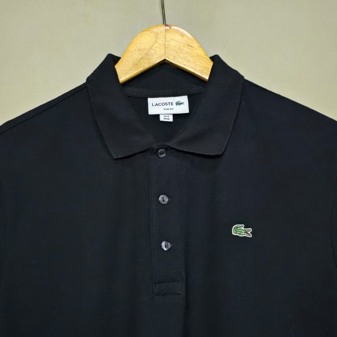 LACOSTE BLACK POLO SHIRT (Category: Tshirts & Polo Shirts ) located in Manila. Submitted by thrift-finds.ph (Listing ID 1466123594, Image 2). Description: LACOSTE BLACK POLO SHIRT - Size: 4 / MEDIUM ( Slim Fit ) - Dimension: 21 W" x 28.5 L" - Good As new - Color rate: 9.8/10 - No Issues - Color may vary due to lighting 📸.