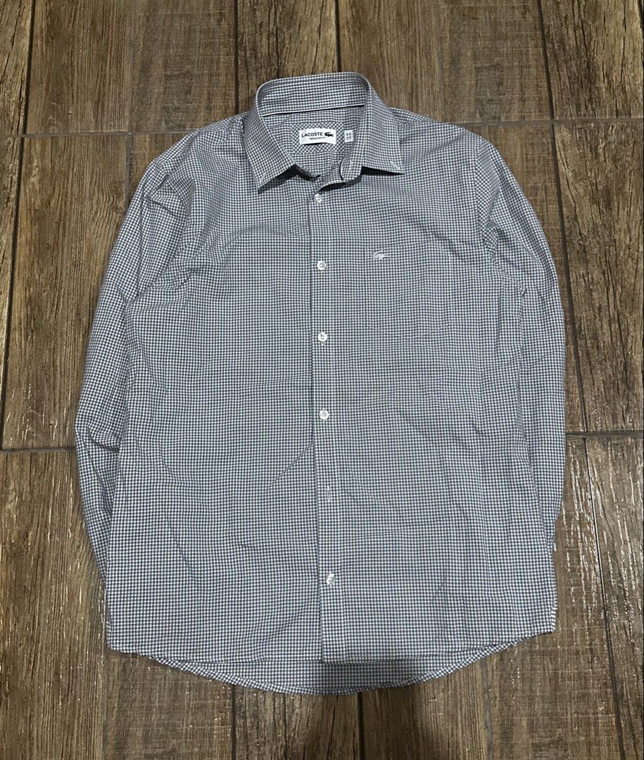 LACOSTE BLUE LONGSLEEVE (Category: Formal Shirts) located in Manila. Submitted by urban.vintage (Listing ID 1466114756, Image 1). Description: ISSUE: NONE (NEED WASH) MOP :GCASH (NO COD) SHIP VIA: LALAMOVE & J&T LOCATION: PASIG CITY LENGTH: 27 WIDTH : 20.