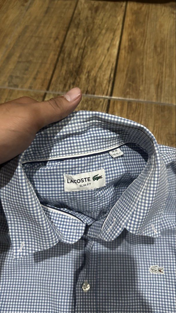 LACOSTE BLUE LONGSLEEVE (Category: Formal Shirts) located in Manila. Submitted by urban.vintage (Listing ID 1466114756, Image 2). Description: ISSUE: NONE (NEED WASH) MOP :GCASH (NO COD) SHIP VIA: LALAMOVE & J&T LOCATION: PASIG CITY LENGTH: 27 WIDTH : 20.