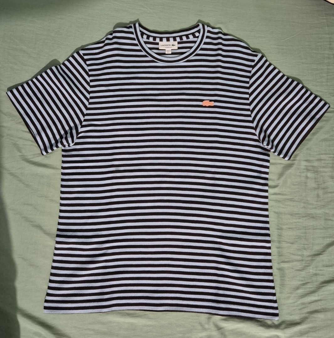 Lacoste Classic Fit Striped T-Shirt (Category: Tshirts & Polo Shirts ) located in Manila. Submitted by Metronome (Listing ID 1465972751, Image 1). Description: Bought in Sm Megamall Lacoste ; released 2026 once used, almost new 9.8/10 no issues 21 x 27.5 Thank you :).