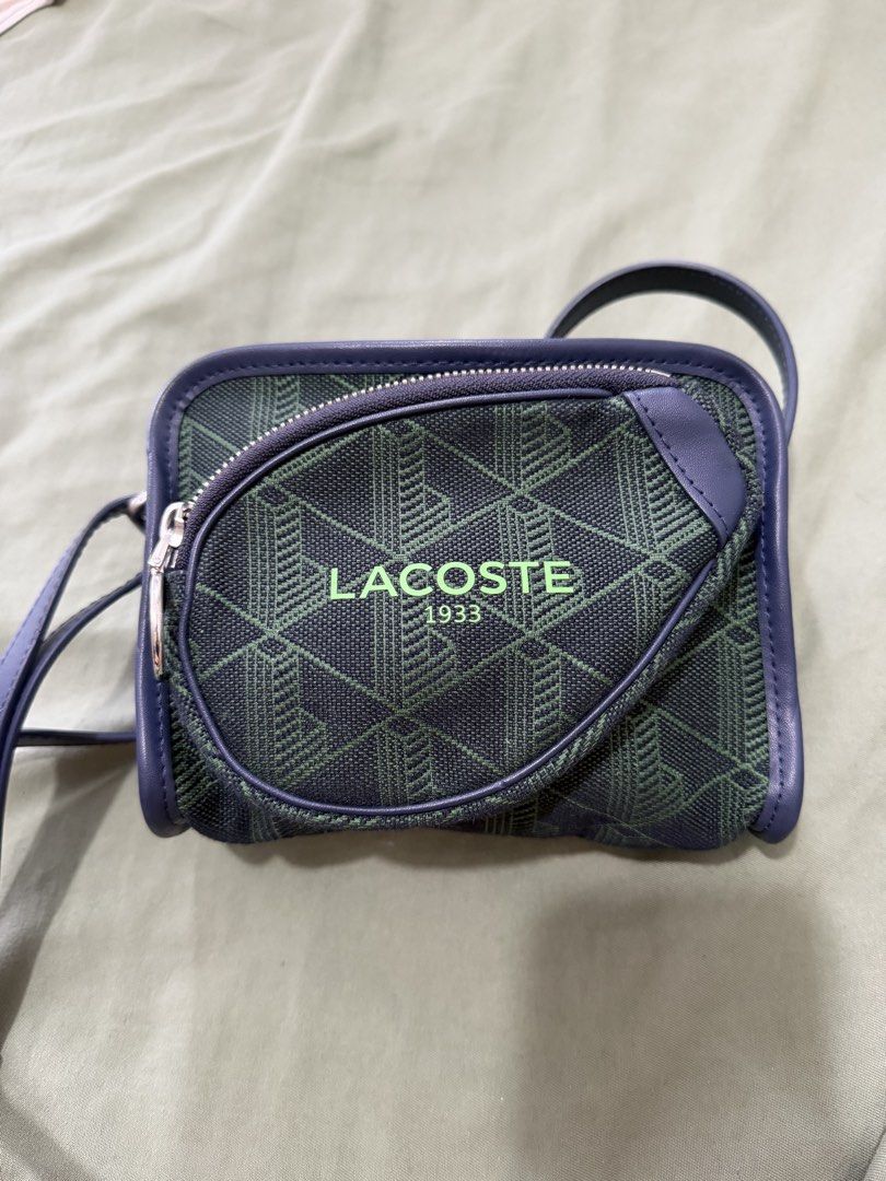 Lacoste Heritage Reporter Bag (Category: Cross-body Bags) located in Quezon City. Submitted by andyclave (Listing ID 1465993424, Image 1). Description: In a very good condition, no damage/issue/defect. Price slightly negotiable..