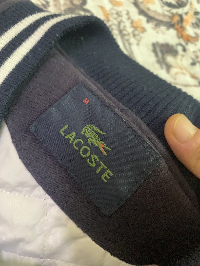 Lacoste jacket (Category: Coats, Jackets and Outerwear) located in Seri Manjung. Submitted by azman262 (Listing ID 1466002721, Image 2). Description: Masih dalam keadaan baik Pit 20 Labuh 25.
