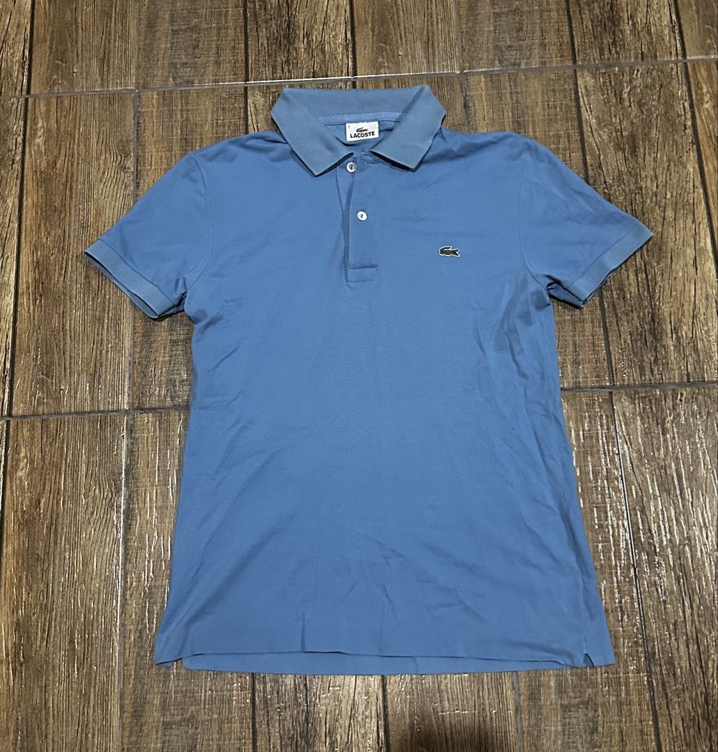 LACOSTE LIGHT BLUE POLO (Category: Tshirts & Polo Shirts ) located in Manila. Submitted by urban.vintage (Listing ID 1466115943, Image 1). Description: ISSUE: NONE (NEED WASH) MOP :GCASH (NO COD) SHIP VIA: LALAMOVE & J&T LOCATION: PASIG CITY LENGTH: 26 WIDTH : 19.