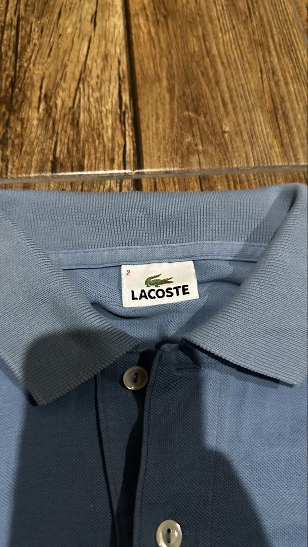 LACOSTE LIGHT BLUE POLO (Category: Tshirts & Polo Shirts ) located in Manila. Submitted by urban.vintage (Listing ID 1466115943, Image 3). Description: ISSUE: NONE (NEED WASH) MOP :GCASH (NO COD) SHIP VIA: LALAMOVE & J&T LOCATION: PASIG CITY LENGTH: 26 WIDTH : 19.