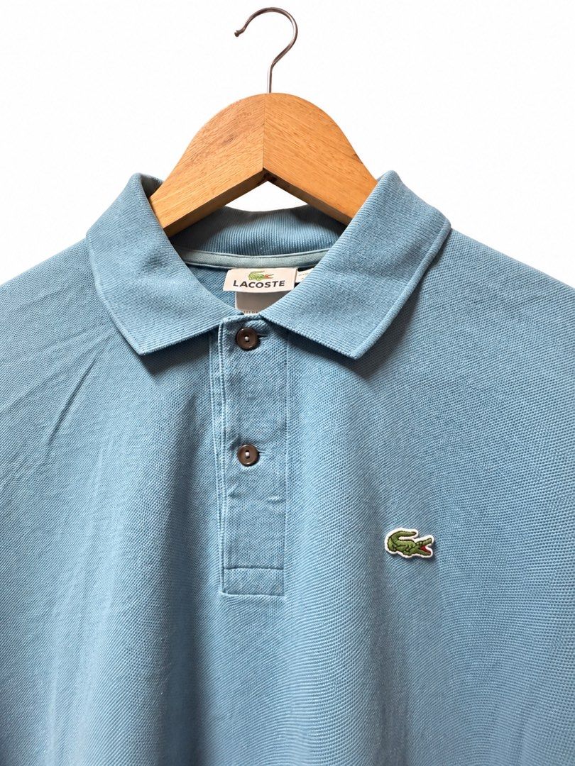 Lacoste Light Blue Polo Shirt Size 4 / M (Category: Tshirts & Polo Shirts ) located in Tangub. Submitted by laurbepena33002 (Listing ID 1465955455, Image 2). Description: - Brand: Lacoste - Color: Light Blue - Size: 4 (Fits AU Medium) -Dimension: W22”xL25.5” - Material: Classic cotton petit pique knit - Features: Traditional two-button placket with dark buttons and signature embroidered green crocodile logo - Condition: Clean interior neck tags a