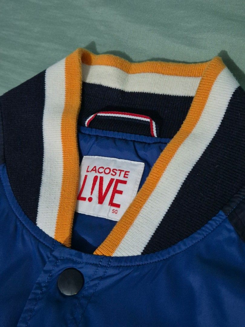 Lacoste Live Varsity Jacket (Category: Coats, Jackets and Outerwear) located in Manila. Submitted by Metronome (Listing ID 1465978043, Image 3). Description: Lacoste Varsity Jacket Well-kept, Personal item, 1st owner, not thrifted Excellent Condition 9.5/10 overall, except for the button, pls see last pic. No Other issues 21 x 26 SRP was : 14k+ My Price : 4,500 Thank you :).