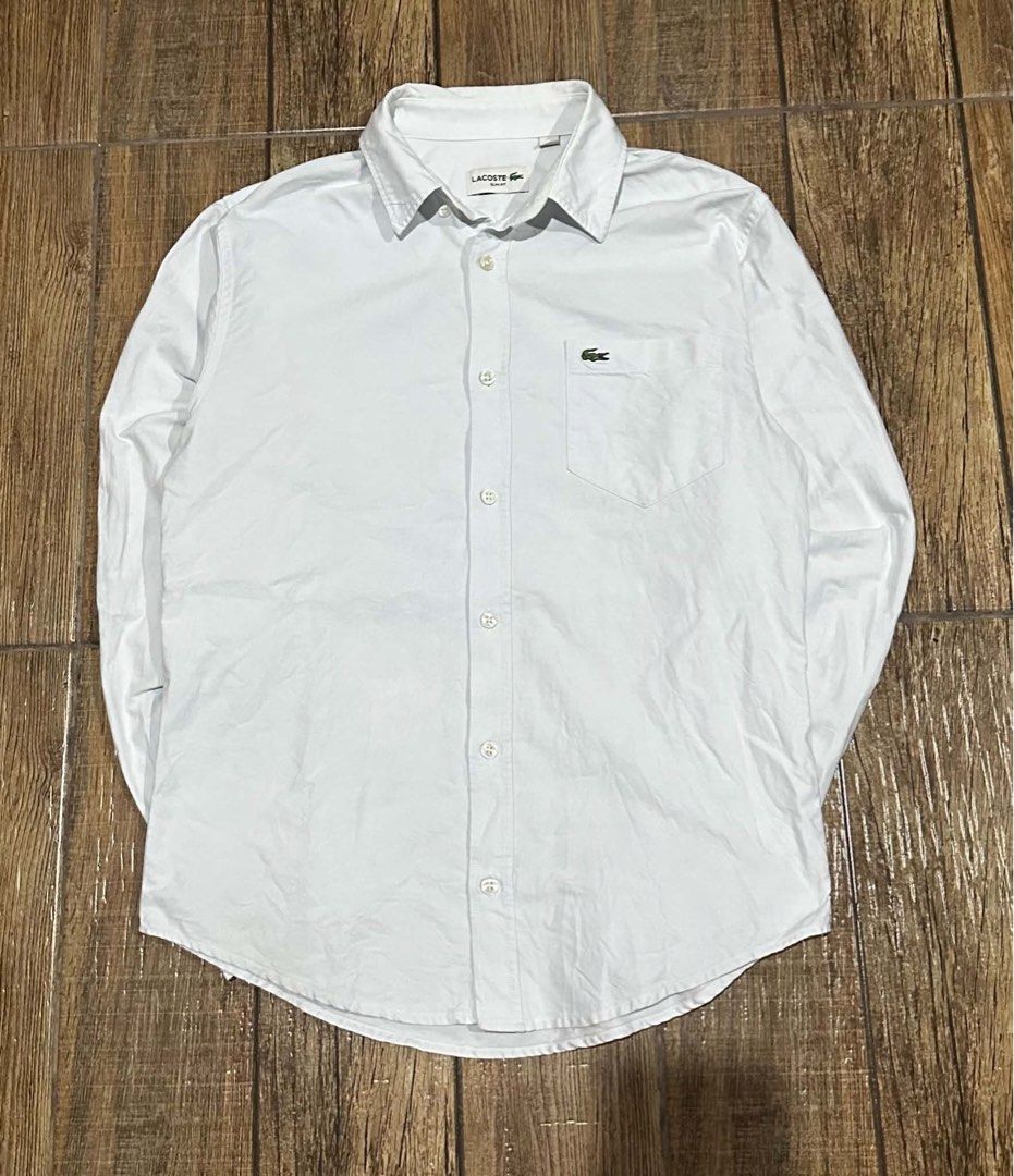 LACOSTE LONGSLEEVE (Category: Tshirts & Polo Shirts ) located in Manila. Submitted by urban.vintage (Listing ID 1466115015, Image 1). Description: ISSUE: NONE (NEED WASH) MOP :GCASH (NO COD) SHIP VIA: LALAMOVE & J&T LOCATION: PASIG CITY LENGTH: 27 WIDTH : 20.