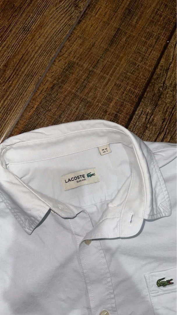 LACOSTE LONGSLEEVE (Category: Tshirts & Polo Shirts ) located in Manila. Submitted by urban.vintage (Listing ID 1466115015, Image 2). Description: ISSUE: NONE (NEED WASH) MOP :GCASH (NO COD) SHIP VIA: LALAMOVE & J&T LOCATION: PASIG CITY LENGTH: 27 WIDTH : 20.