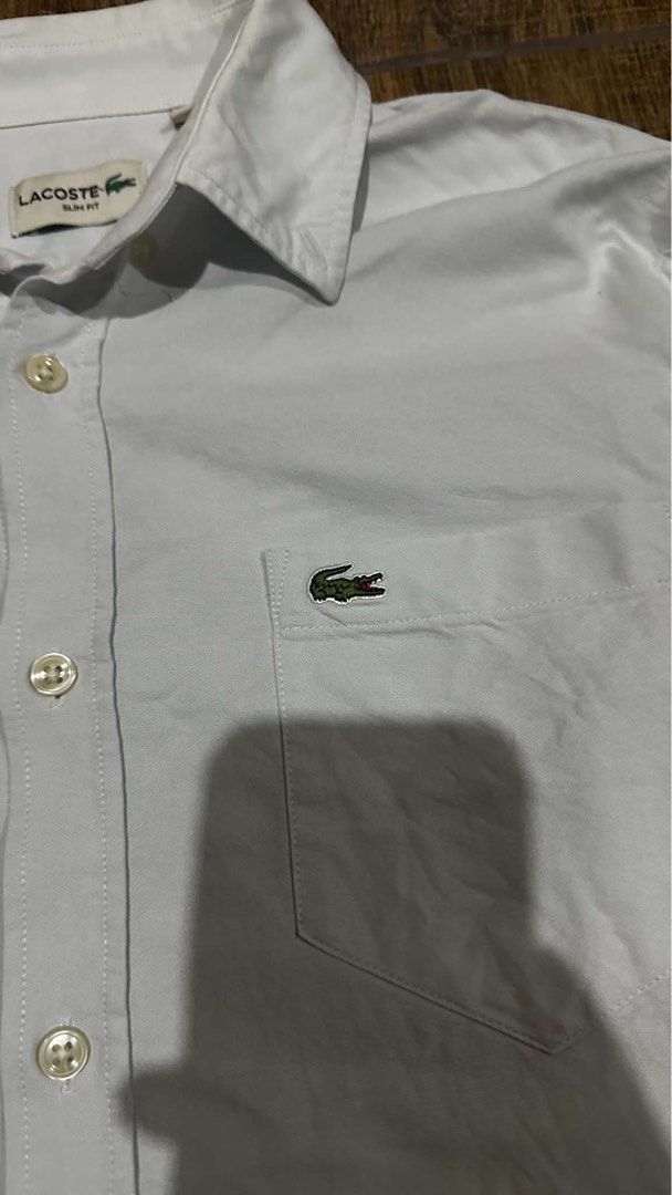 LACOSTE LONGSLEEVE (Category: Tshirts & Polo Shirts ) located in Manila. Submitted by urban.vintage (Listing ID 1466115015, Image 3). Description: ISSUE: NONE (NEED WASH) MOP :GCASH (NO COD) SHIP VIA: LALAMOVE & J&T LOCATION: PASIG CITY LENGTH: 27 WIDTH : 20.