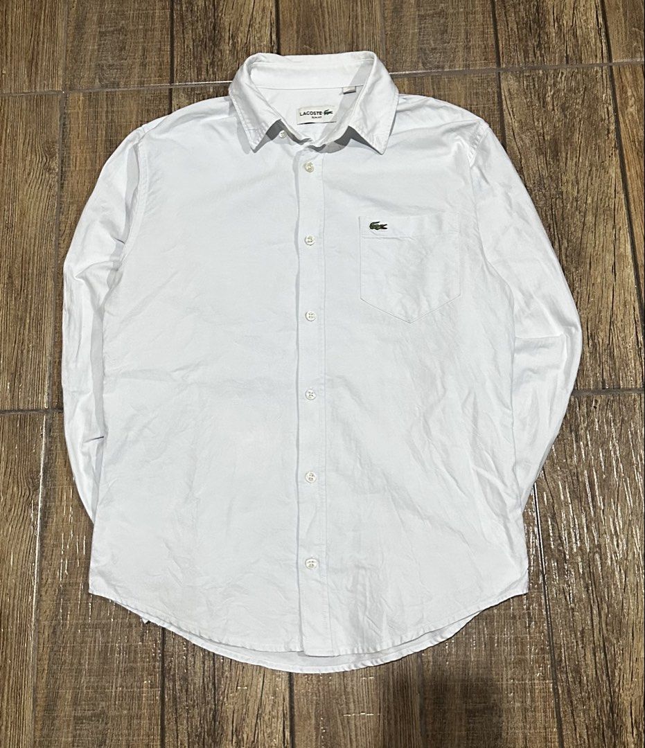 LACOSTE LONGSLEEVE (Category: Formal Shirts) located in Manila. Submitted by urban-vintage_2 (Listing ID 1466118593, Image 1). Description: ISSUE: NONE (NEED WASH) MOP :GCASH (NO COD) SHIP VIA: LALAMOVE & J&T LOCATION: PASIG CITY LENGTH: 27 WIDTH : 20 .