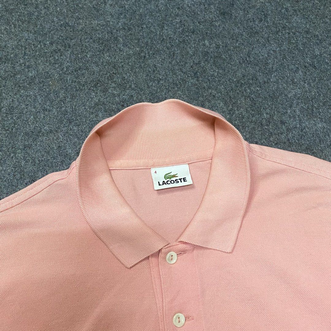 Lacoste Pink Polo Shirt Size 4 (Category: Shirts) located in Cebu City. Submitted by callmejasonx (Listing ID 1465967786, Image 3). Description: - Brand: Lacoste - Color: Pink - Size: 4 (Medium) - Material: Comfortable cotton and polyurethane blend with stretch - Design: Classic short sleeve, button placket, and side hem slits - Logo: Iconic embroidered green crocodile on the chest - Condition: Excellent, clean interior tags intact -Size 4 Fit M 
