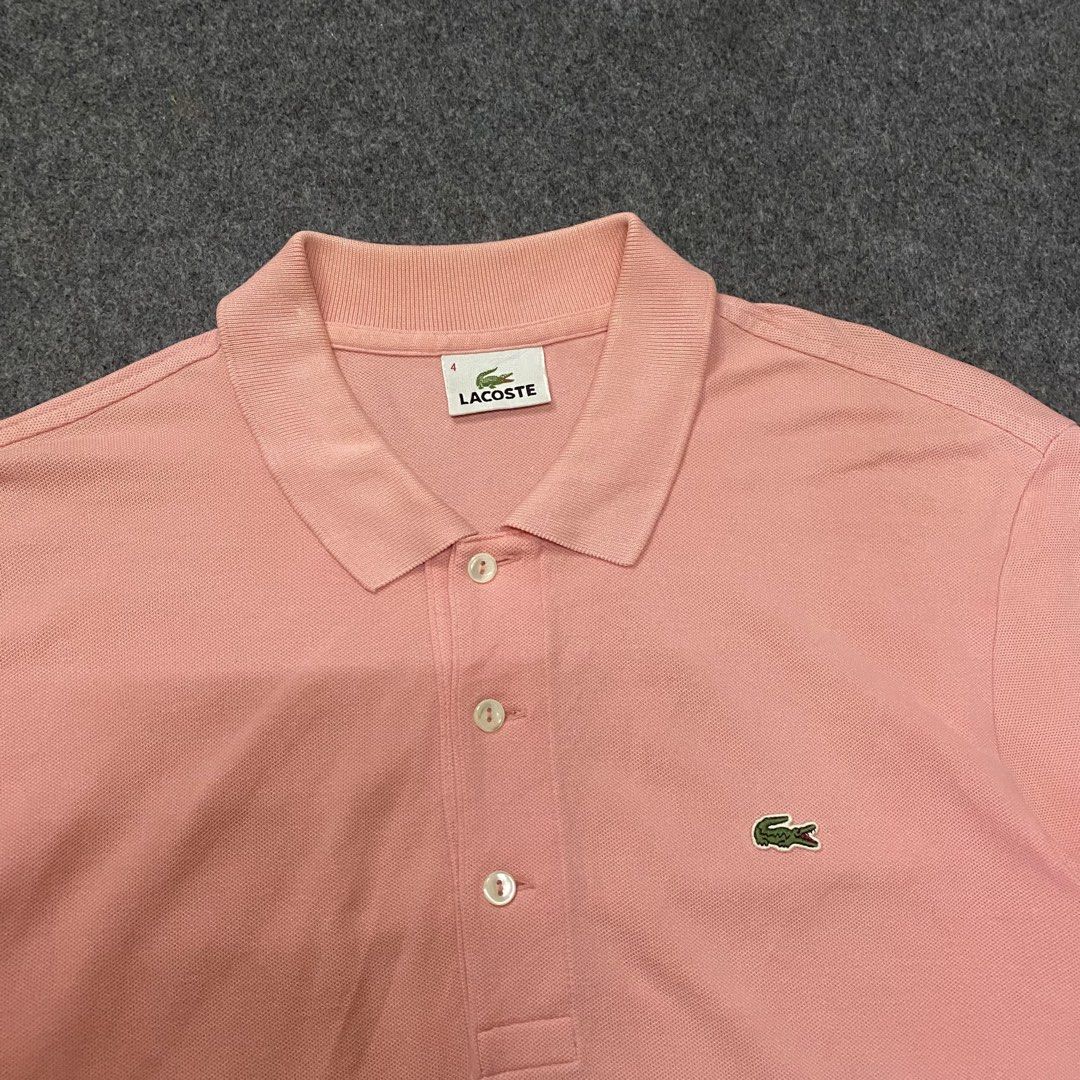 Lacoste Pink Polo Shirt Size 4 (Category: Shirts) located in Cebu City. Submitted by callmejasonx (Listing ID 1465967786, Image 2). Description: - Brand: Lacoste - Color: Pink - Size: 4 (Medium) - Material: Comfortable cotton and polyurethane blend with stretch - Design: Classic short sleeve, button placket, and side hem slits - Logo: Iconic embroidered green crocodile on the chest - Condition: Excellent, clean interior tags intact -Size 4 Fit M 