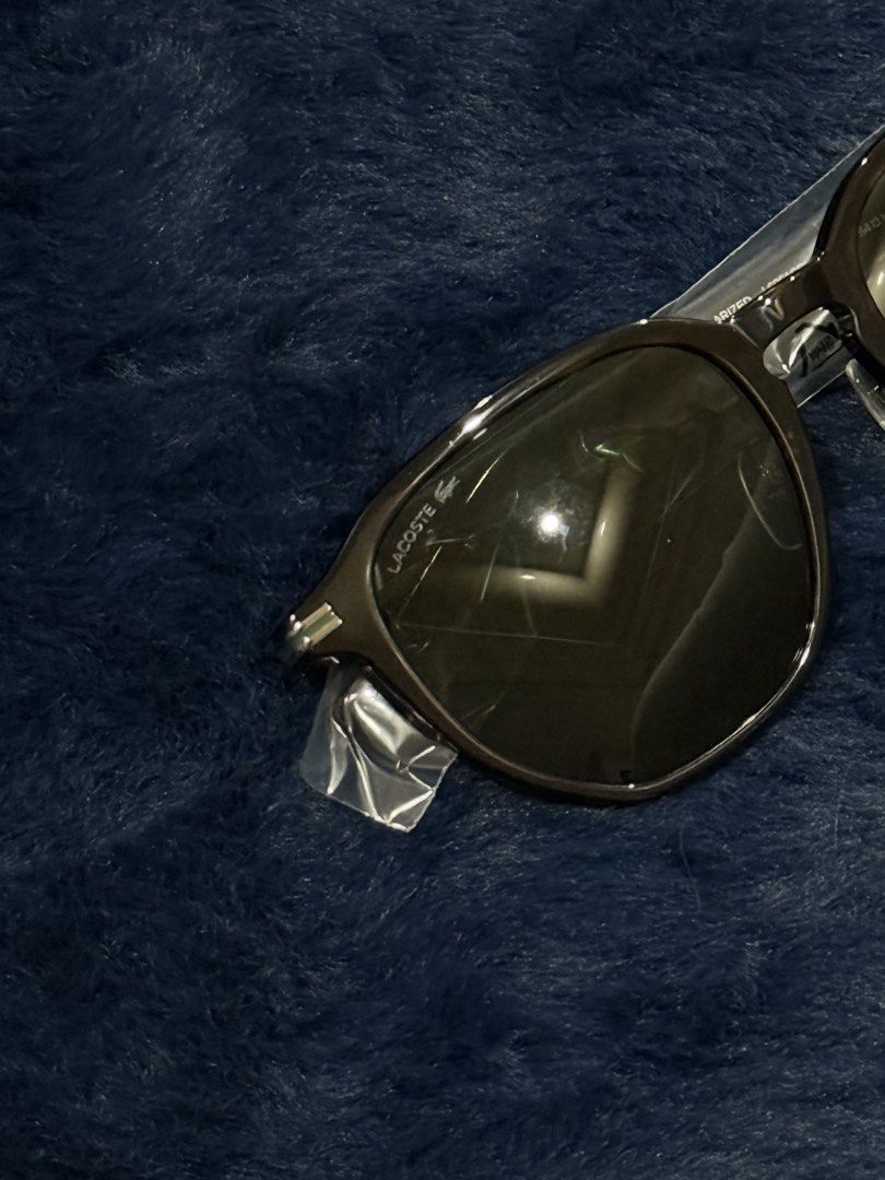 Lacoste Polarized Sunglasses Dark Brown Frame (Category: Sunglasses & Eyewear) located in Manila. Submitted by snowflakesi (Listing ID 1465968600, Image 2). Description: - Style: Classic square shape with dark brown frames - Lenses: Polarized with gradient tint - Features: Lightweight build, adjustable nose pads, metallic temple logo, and subtle lens branding - Perfect for daily wear Helping my ninang sell authentic sunglasses. ☀️ .