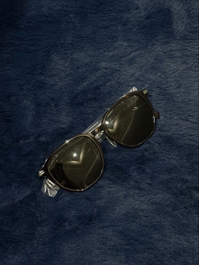 Lacoste Polarized Sunglasses Dark Brown Frame (Category: Sunglasses & Eyewear) located in Manila. Submitted by snowflakesi (Listing ID 1465968600, Image 1). Description: - Style: Classic square shape with dark brown frames - Lenses: Polarized with gradient tint - Features: Lightweight build, adjustable nose pads, metallic temple logo, and subtle lens branding - Perfect for daily wear Helping my ninang sell authentic sunglasses. ☀️ .