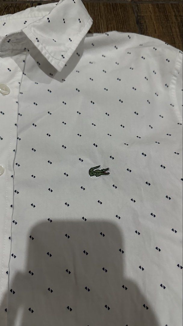 LACOSTE POLKA DOTS (Category: Formal Shirts) located in Manila. Submitted by urban-vintage_2 (Listing ID 1466119167, Image 2). Description: ISSUE: NONE (NEED WASH) MOP :GCASH (NO COD) SHIP VIA: LALAMOVE & J&T LOCATION: PASIG CITY LENGTH: 27 WIDTH : 20.