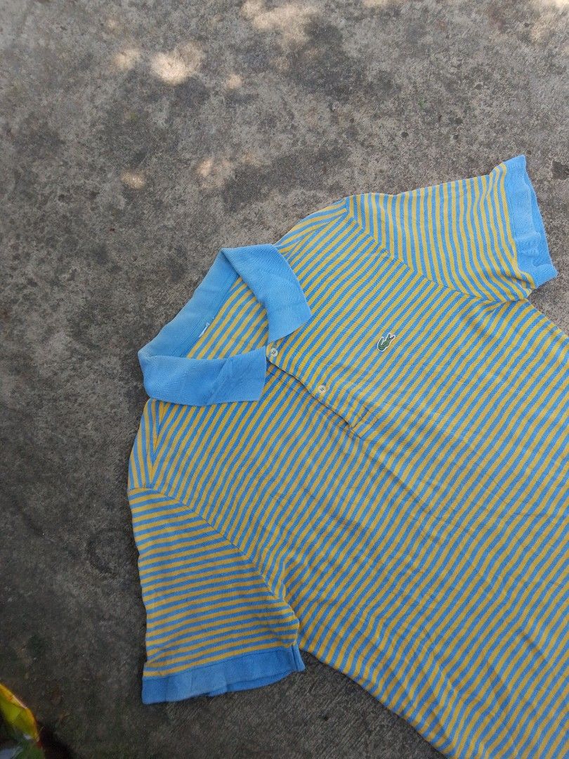 Lacoste poloshirt (Category: Tshirts & Polo Shirts ) located in Naga. Submitted by choythrift (Listing ID 1466131949, Image 3). Description: Lacoste poloshirt Turquoise and yellow stripes Condition: 9/10 Color rate: 9/10 Plus shipping fee Courier: J and t, flash express Drop off: Urban Chicc Location: Naga City, Bicol📍 📩.