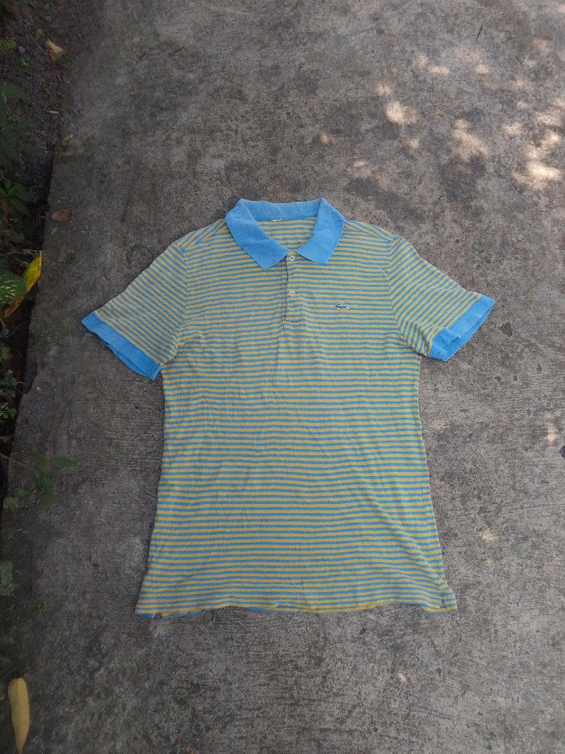 Lacoste poloshirt (Category: Tshirts & Polo Shirts ) located in Naga. Submitted by choythrift (Listing ID 1466131949, Image 1). Description: Lacoste poloshirt Turquoise and yellow stripes Condition: 9/10 Color rate: 9/10 Plus shipping fee Courier: J and t, flash express Drop off: Urban Chicc Location: Naga City, Bicol📍 📩.