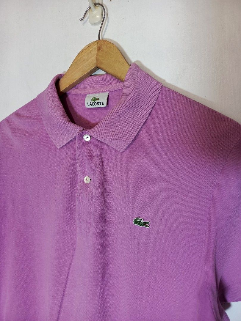 LACOSTE SHIRT (Category: Shirts) located in Baguio. Submitted by 074thriftmania (Listing ID 1466120677, Image 2). Description: - 100% Authentic Lacoste polo shirt - Color: Nice shade of pink - Size: 4 - Material: Classic cotton pique, machine washable - Details: Ribbed collar and cuffs, mother-of-pearl buttons - Branding: Neat embroidered green crocodile logo on the chest - Condition/Use: Great casual piece for everyday wear length 26" width 20".