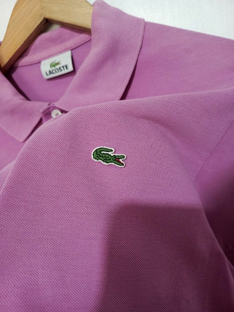 LACOSTE SHIRT (Category: Shirts) located in Baguio. Submitted by 074thriftmania (Listing ID 1466120677, Image 3). Description: - 100% Authentic Lacoste polo shirt - Color: Nice shade of pink - Size: 4 - Material: Classic cotton pique, machine washable - Details: Ribbed collar and cuffs, mother-of-pearl buttons - Branding: Neat embroidered green crocodile logo on the chest - Condition/Use: Great casual piece for everyday wear length 26" width 20".
