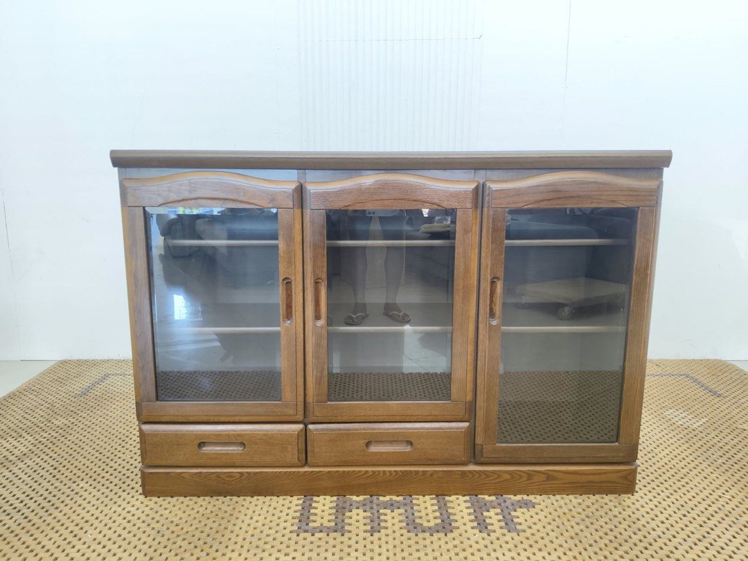 Lateral Display Cabinet (Category: Shelves, Cabinets & Racks) located in Quezon City. Submitted by matetdevis13 (Listing ID 1465976205, Image 3). Description: Wooden Glass Door Lateral Cabinet Price: 8,500 L52 x W17.5 x H35.5 In good condition Code MJS42-RB25.