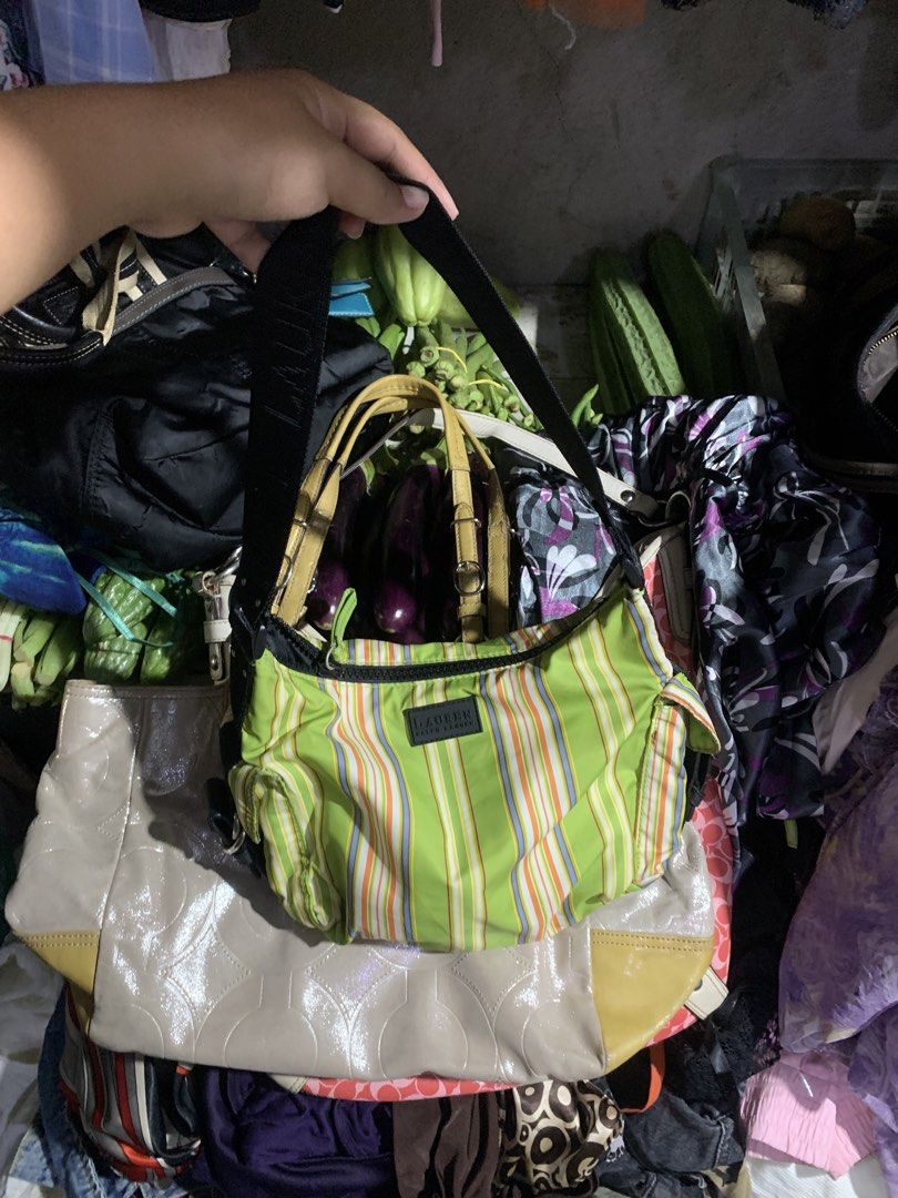 Lauren Ralph Green Striped Shoulder Bag (Category: Shoulder Bags) located in Manila. Submitted by thriftnivee (Listing ID 1466099882, Image 1). Description: - Authentic Lauren Ralph Lauren shoulder bag in a vibrant bright green - Features eye-catching vertical stripes in orange, yellow, and blue - Comfortable black fabric strap with chic silver hardware rings - Secure zip top closure for daily essentials - Black-lined interior equipped with multi
