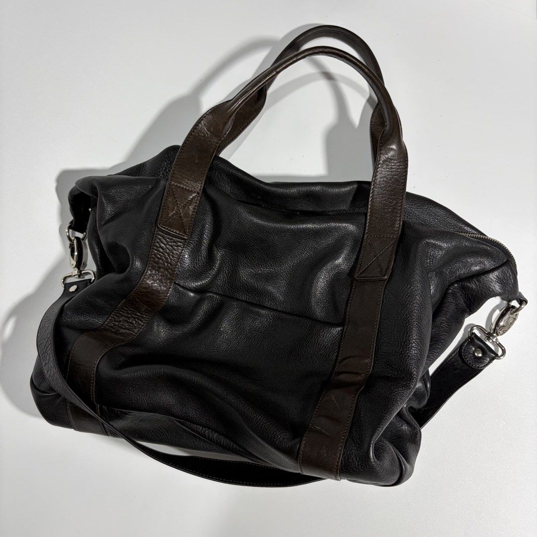 Leather japan Shoulder Bag Handbag 2Way (Category: Shoulder Bags) located in Magalang. Submitted by luxgood18 (Listing ID 1466125247, Image 3). Description: Materials: The main body is crafted from a soft, heavily grained pebbled black leather Lining fabric: Fully lined with a bold, high-contrast black and cream vertical stripe print fabric featuring a soft satin or twill finish. .