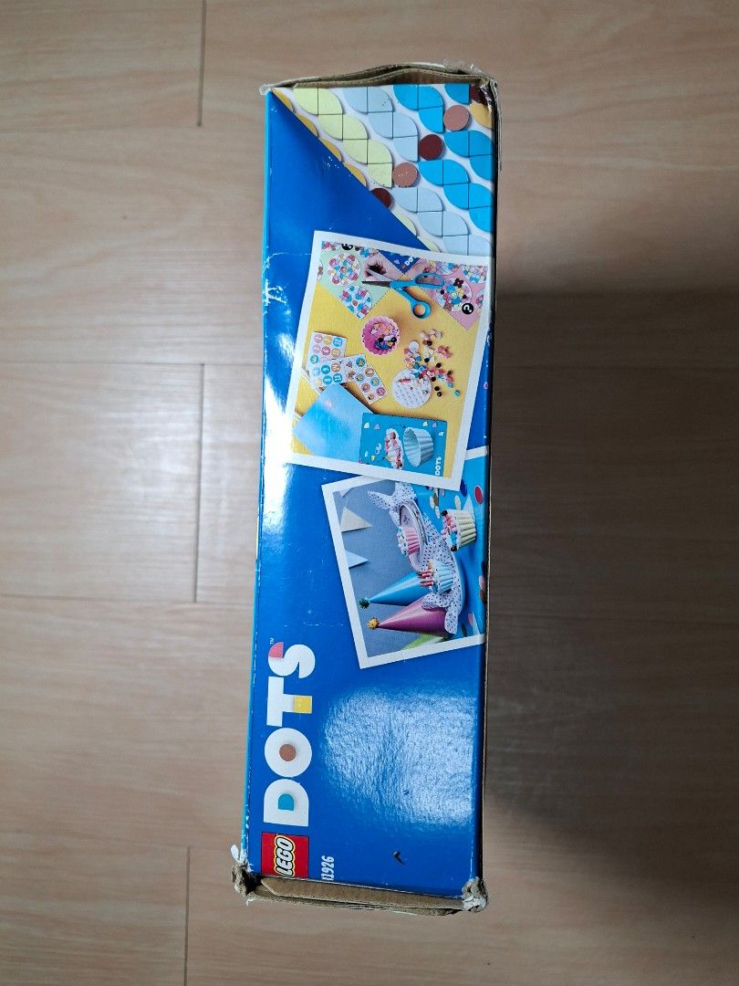 LEGO DOTS Creative Party Kit 41926 (Category: Lego & Building Sets) located in Baguio. Submitted by restyrille77846 (Listing ID 1465983359, Image 3). Description: - LEGO DOTS Creative Party Kit (Set 41926) - Includes 622 pieces to build and decorate fun cupcakes with removable lids - Opened box, but 100% complete with all original colorful mosaic tiles and instruction booklets - Ideal activity for kids' parties, playdates, or group crafting.