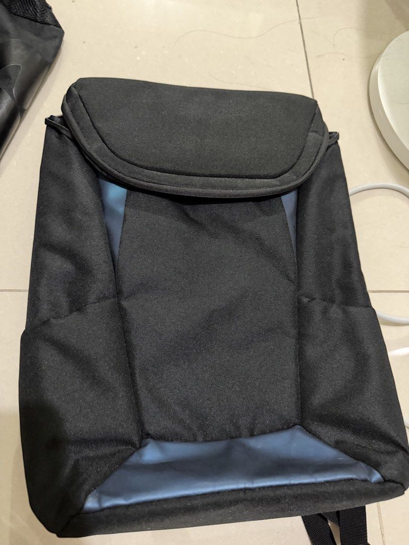Lenovo black and blue laptop backpack (Category: Backpacks) located in Makati City. Submitted by japaneseshop (Listing ID 1466108955, Image 1). Description: - Color: Sleek black with stylish blue accents - Comfort: Padded mesh back panels for all-day carrying comfort - Straps: Adjustable shoulder straps featuring a Lenovo branding tag on the right strap - Convenience: Sturdy top handle for easy grab-and-go - Capacity: Fits laptops and your daily 