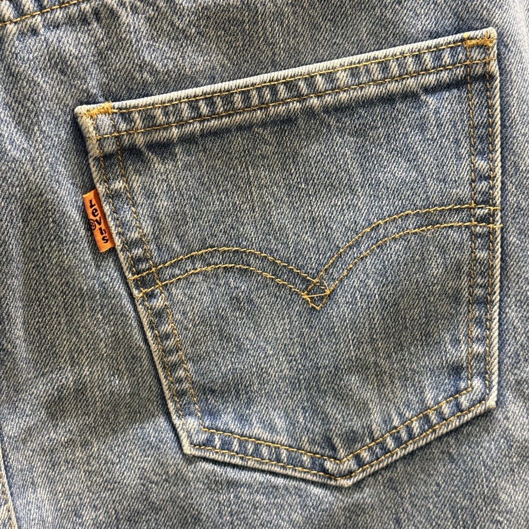 Levi's denim skirt size 26 (Category: Skirts) located in Muntinlupa City. Submitted by lovedbyapril (Listing ID 1466044108, Image 3). Description: - Brand: Levi's - Style: Light blue wash denim A-line skirt - Size: 26 - Closure: Front full zip with round ring pull - Pockets: Front slant pockets and back patch pockets - Details: Iconic Levi's orange tab and leather patch at the waistband - Condition: Brand new, no tag 💌 RFS: Decluttering, need st