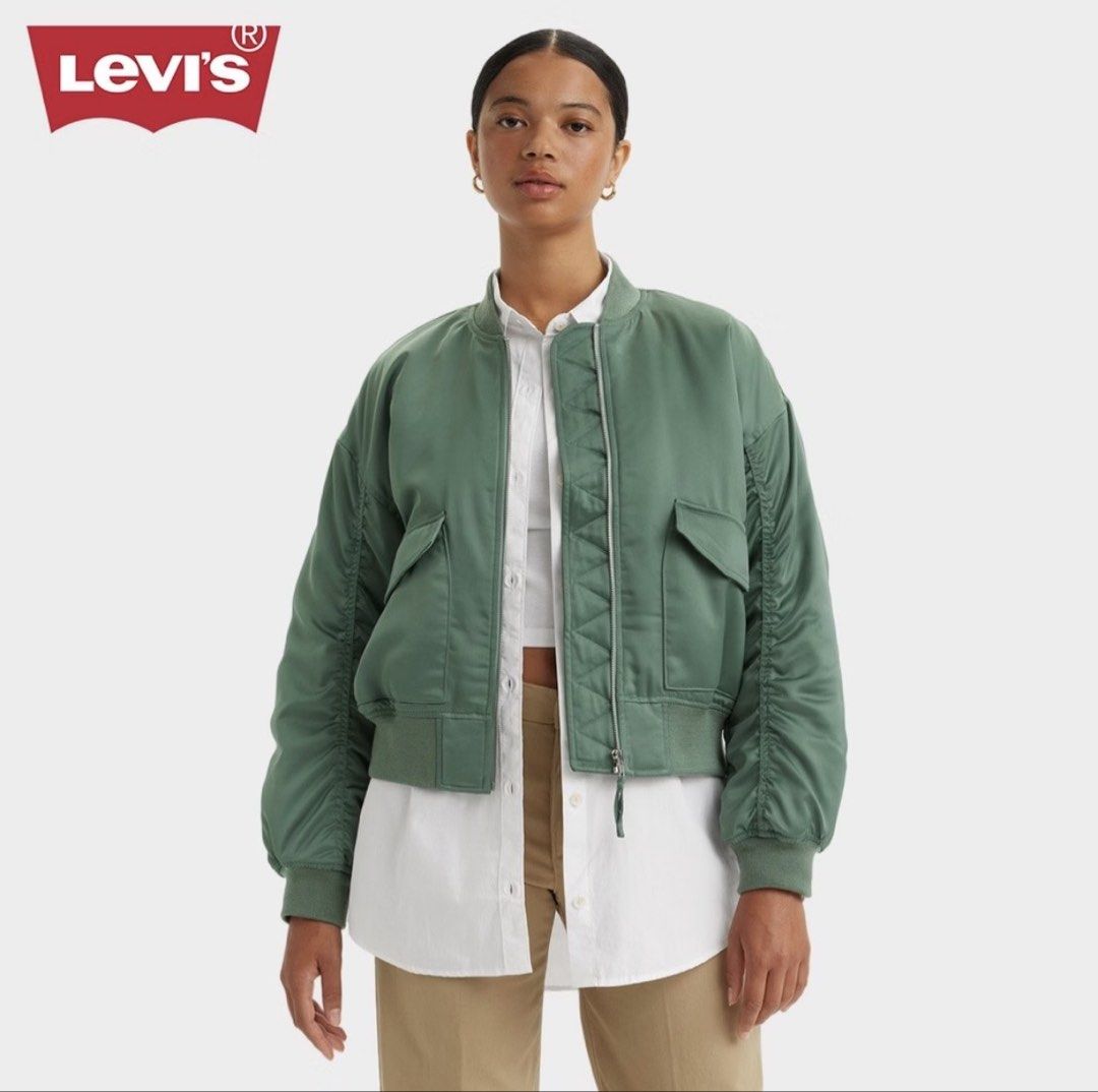 Levi's Green Bomber Jacket (Category: Coats, Jackets and Outerwear) located in Taguig. Submitted by aziald (Listing ID 1466044063, Image 2). Description: - Brand: Levi's (Andy Tech Jacket) - Color: Nice olive/green - Fit: Relaxed bomber style with trendy ruched sleeves - Features: Zip front closure, side flap pockets, ribbed collar, cuffs, and hem - Original Retail Price: €149.95 - Condition: Never been used / Excellent quality - Perfect for dail