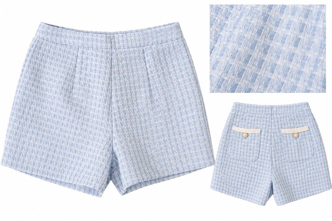 Light Blue Tweed Shorts with Back Pockets (Category: Shorts) located in Cavite. Submitted by getmyclutter (Listing ID 1466020152, Image 1). Description: - Color: Light blue with textured check pattern - Fit: High-waisted, classic tailored shape with front darts - Details: Two back patch pockets with cream trim and pearl-accented buttons - Versatility: Great for casual days or dressed up with a blouse - Condition: Excellent, clean seams with no fl