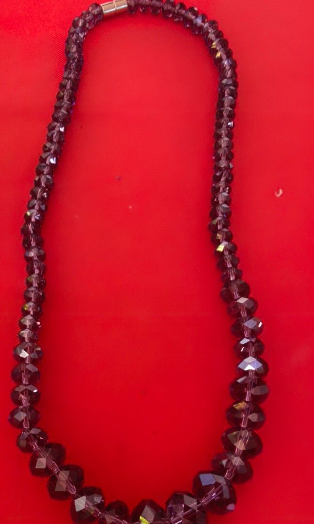 Like new purple crystal necklace (Category: Necklaces) located in Tuguegarao City. Submitted by zenphoenix-7ad615 (Listing ID 1466040514, Image 3). Description: Purple crystal necklace Magnetic closure.