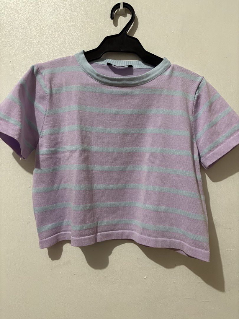 Lilac and Blue Striped Knit Crop Top (Category: Sleeveless) located in Manila. Submitted by nykji96 (Listing ID 1465965792, Image 1). Description: - Style: Short sleeve knit crop top - Color/Design: Lilac base with light blue horizontal stripes and blue trim on the round neckline - Details: Ribbed hem on sleeves and bottom - Fabric: Soft and comfortable material - Fit: True to size, great for casual wear or layering - na stock lang .