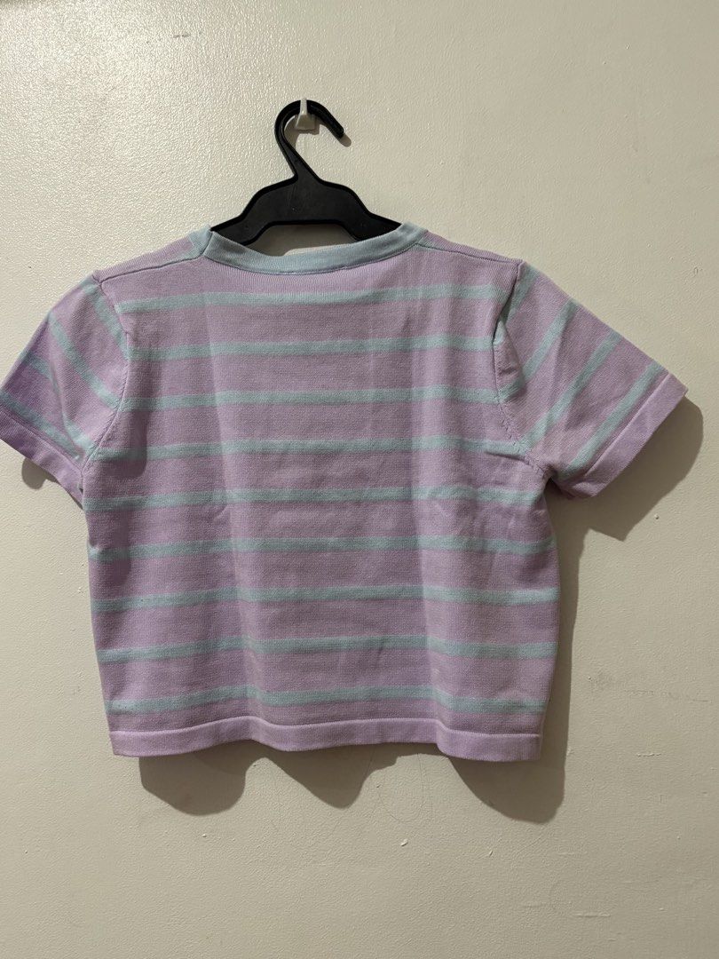 Lilac and Blue Striped Knit Crop Top (Category: Sleeveless) located in Manila. Submitted by nykji96 (Listing ID 1465965792, Image 2). Description: - Style: Short sleeve knit crop top - Color/Design: Lilac base with light blue horizontal stripes and blue trim on the round neckline - Details: Ribbed hem on sleeves and bottom - Fabric: Soft and comfortable material - Fit: True to size, great for casual wear or layering - na stock lang .