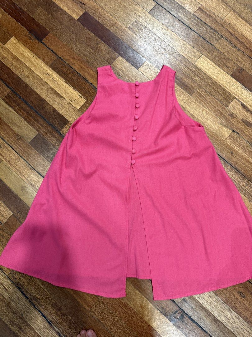 Linen Hot Pink A Line Halter Blouse (Category: Sleeveless) located in Iloilo. Submitted by dabyladaby2 (Listing ID 1465982131, Image 2). Description: Once Used Shoulder -28cm Chest-48cm Length-68cm Covered Botton Accent at the Back .
