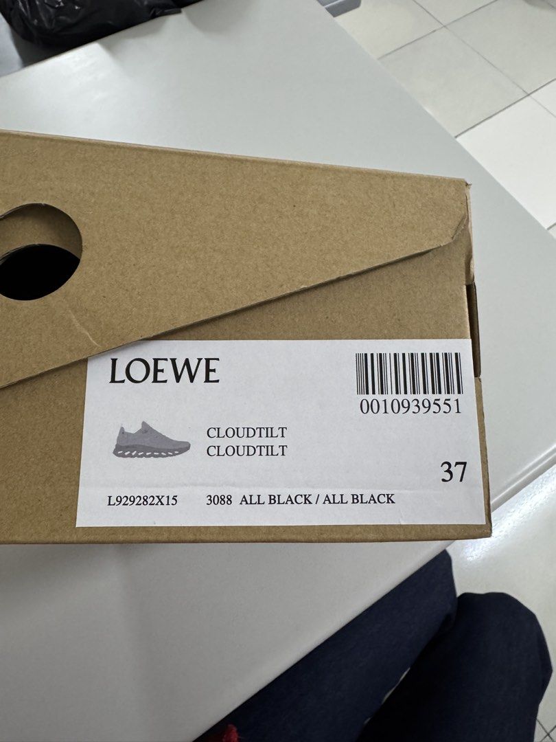 Loewe x On Cloudtilt All Black Size 37 (Category: Sneakers & Footwear) located in Pasig City. Submitted by juwlgaga (Listing ID 1466033496, Image 3). Description: - Brand: Loewe x On Cloudtilt - Color: All Black - Size: EU 37 - Condition: Brand new, unworn - Design: Super comfortable slip-on with iconic hollowed-out sole - Inclusions: Complete with original box, dust bags, extra laces, and cards.