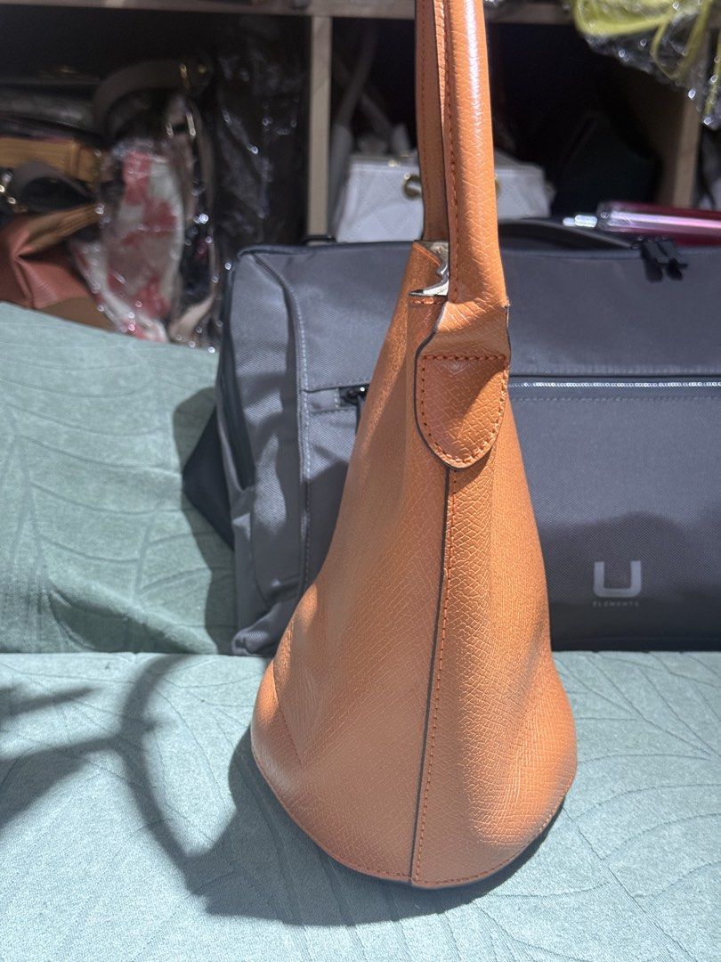 Long champ bucket bag (Category: Luxury Bags & Wallets) located in Quezon City. Submitted by mathezedc (Listing ID 1466061016, Image 1). Description: .
