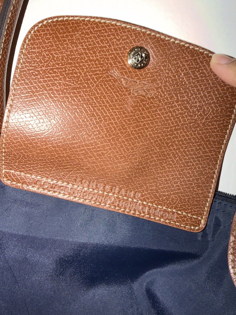 Longchamp (Category: Tote Bags) located in Caloocan City. Submitted by amethystlove14 (Listing ID 1466022779, Image 3). Description: Longchamp Tote Large YKK zip with flaws in last 2 photos zipper broke and with small hole in corners .