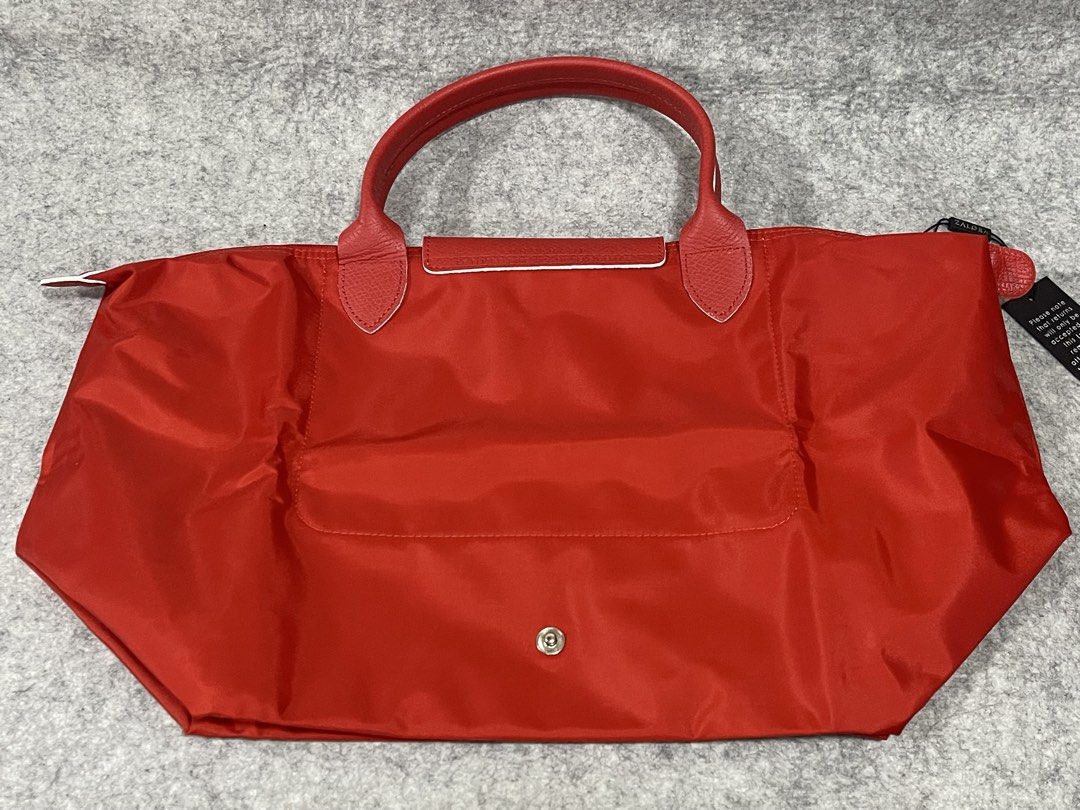 longchamp (Category: Tote Bags) located in Calamba. Submitted by thriftingoverload (Listing ID 1466077543, Image 3). Description: plus shipping fee.