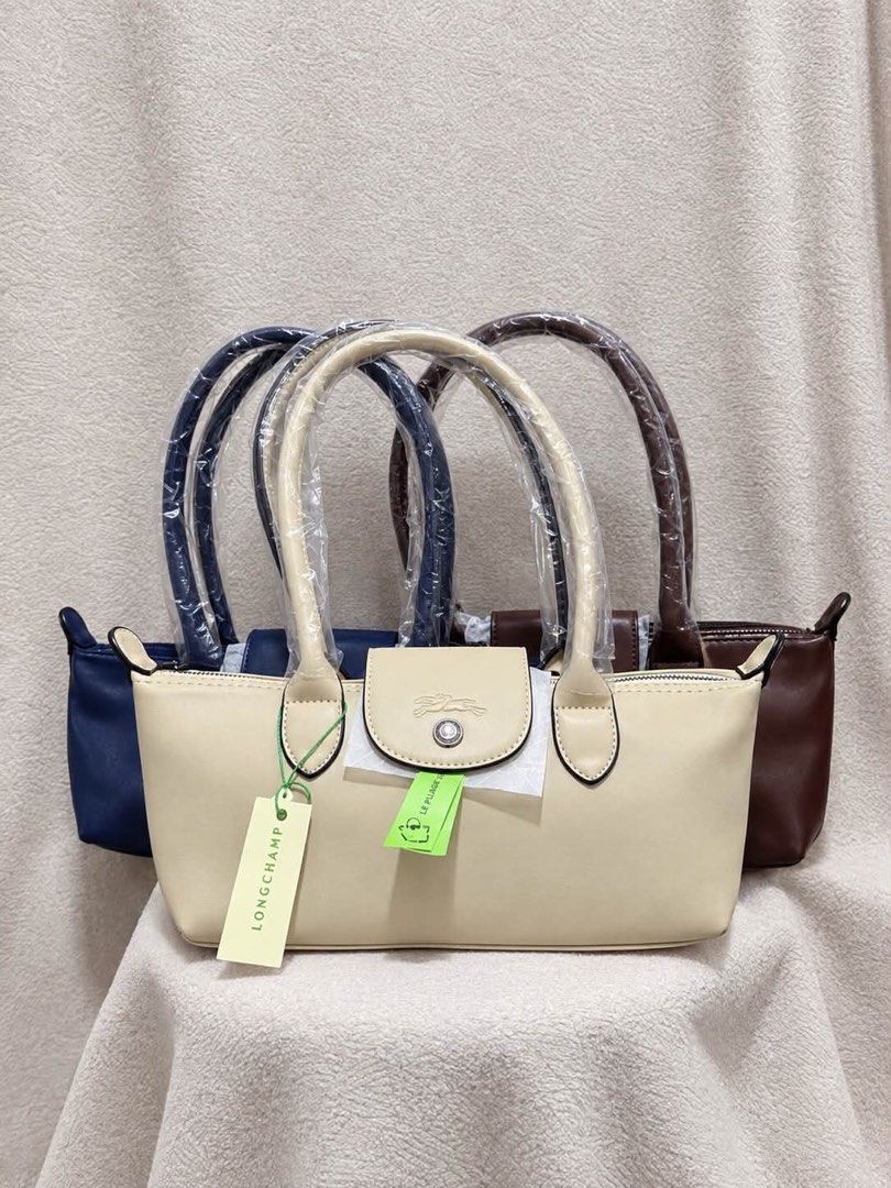 Longchamp Le Pliage Extra Small Handbag (made in vietnam) (Category: Luxury Bags & Wallets) located in Manila. Submitted by dawnlunar (Listing ID 1466058824, Image 1). Description: Brand new - Available Colors: Cream, blue, and brown - Condition: Brand new.