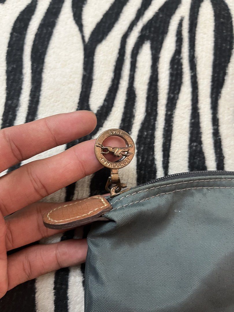 Longchamp nylon bag (Category: Shoulder Bags) located in Manila. Submitted by royaldripmanila (Listing ID 1465978164, Image 3). Description: Sign of usage W18 L11.