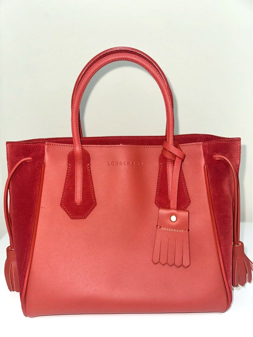 LONGCHAMP TOTE BAG (AUTHENTIC) (Category: Luxury Bags & Wallets) located in Bulacan. Submitted by declutterwithme128 (Listing ID 1466103184, Image 2). Description: —original (not class a or high quality) - bought in taiwan w/ dustbag (longchamp store) - still in very good condition (like new) - slightly negotiable - will send more pics / videos for sure buyer only - j&t / lalamove only.