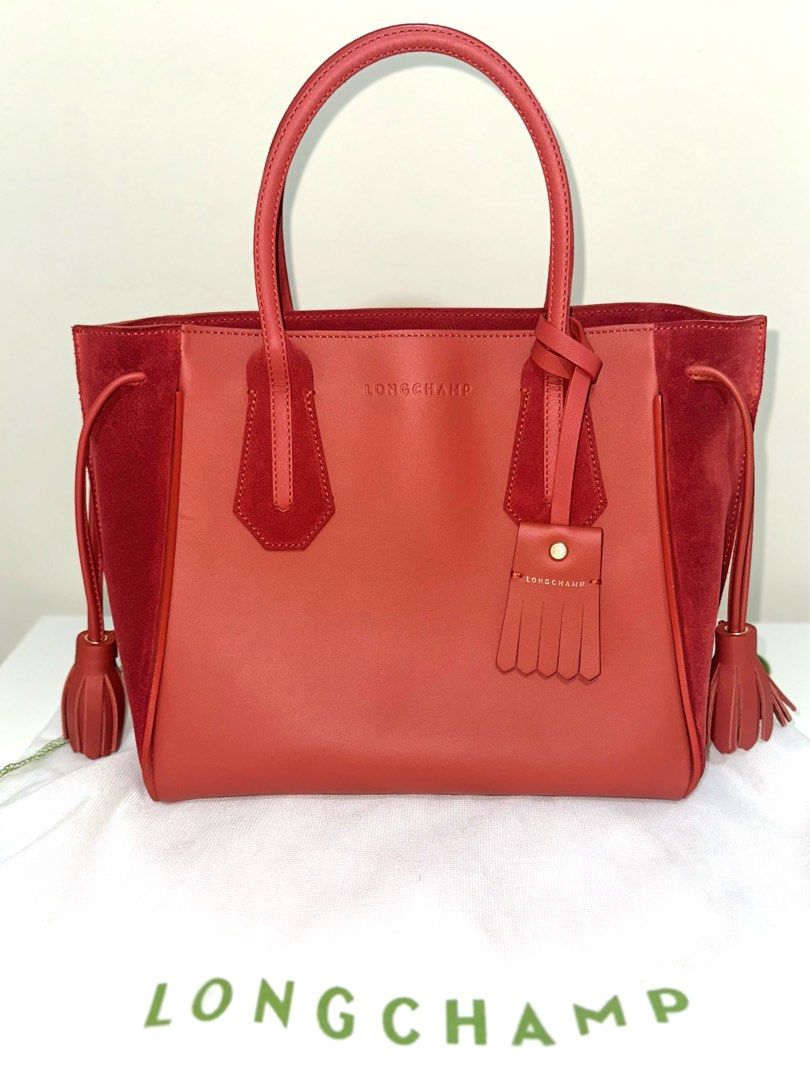 LONGCHAMP TOTE BAG (AUTHENTIC) (Category: Luxury Bags & Wallets) located in Bulacan. Submitted by declutterwithme128 (Listing ID 1466103184, Image 1). Description: —original (not class a or high quality) - bought in taiwan w/ dustbag (longchamp store) - still in very good condition (like new) - slightly negotiable - will send more pics / videos for sure buyer only - j&t / lalamove only.