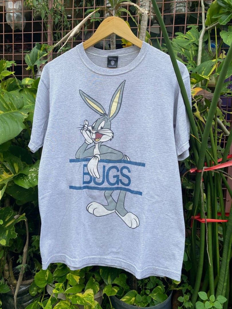 LOONEY TUNES || BUGS BUNNY 1997 (Category: Tshirts & Polo Shirts ) located in Manila. Submitted by sae.ae (Listing ID 1465975353, Image 1). Description: WARNER BROS hard tag Declear as boot 222 stitching M on tag 20x26 Good condition Issue: repaired holes, hairlines crack, pin hole.
