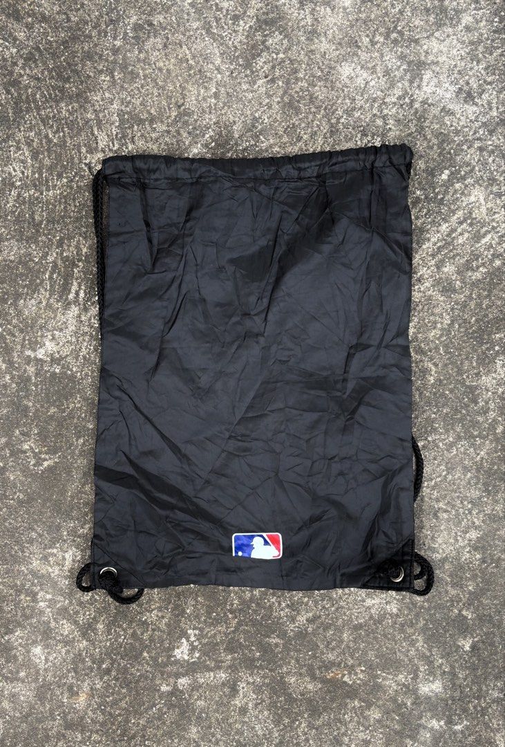 Los Angeles Dodgers MLB Black Drawstring Bag (Category: Backpacks) located in Naga. Submitted by ajrc.shop (Listing ID 1466093574, Image 2). Description: MLB Los Angeles Dodgers drawstring bag ✅Size: S ✅Width: 12.5 ✅Length: 17.2 ✅Color Rate: 9/10 ✅Issue: Nasa pic ✅Need Wash ✅Location: Bicol Naga City, Camarines Sur ✅Courier: J&T Express/Flash Express ✅MOP: Gcash only.