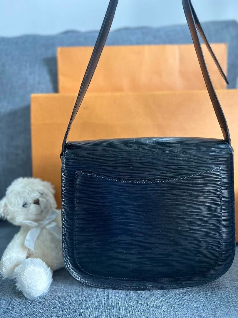 Louis Vuitton Epi Leather Black Shoulder Bag (Category: Luxury Bags & Wallets) located in Manila. Submitted by youngfox.e83fc9 (Listing ID 1466019033, Image 2). Description: - Authentic Louis Vuitton shoulder bag in classic black textured Epi leather - Elegant gold-tone hardware with an adjustable strap for a custom fit - Secure flap closure featuring a chic ring accent - Convenient exterior back slip pocket for quick access - Spacious dark fabri