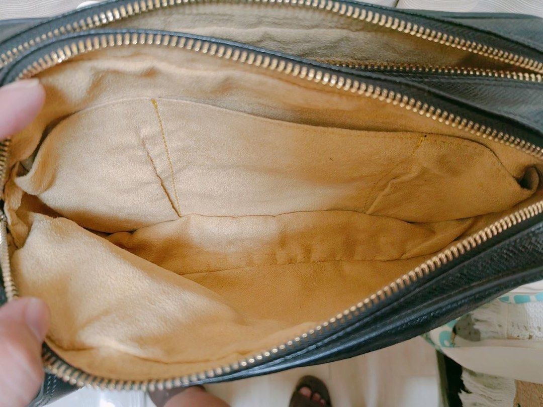 Louis Vuitton Green Canvas Messenger Bag Big Size (Category: Luxury Bags & Wallets) located in Manila. Submitted by junejanuary (Listing ID 1466145621, Image 3). Description: - Brand: Louis Vuitton - Material: Green canvas with brown leather trim - Design: Large embossed logo on front, open flap style - Strap: Adjustable grey fabric strap with branding - Condition: Minor wear on leather edging from normal use, sturdy construction - Ideal for: Dai